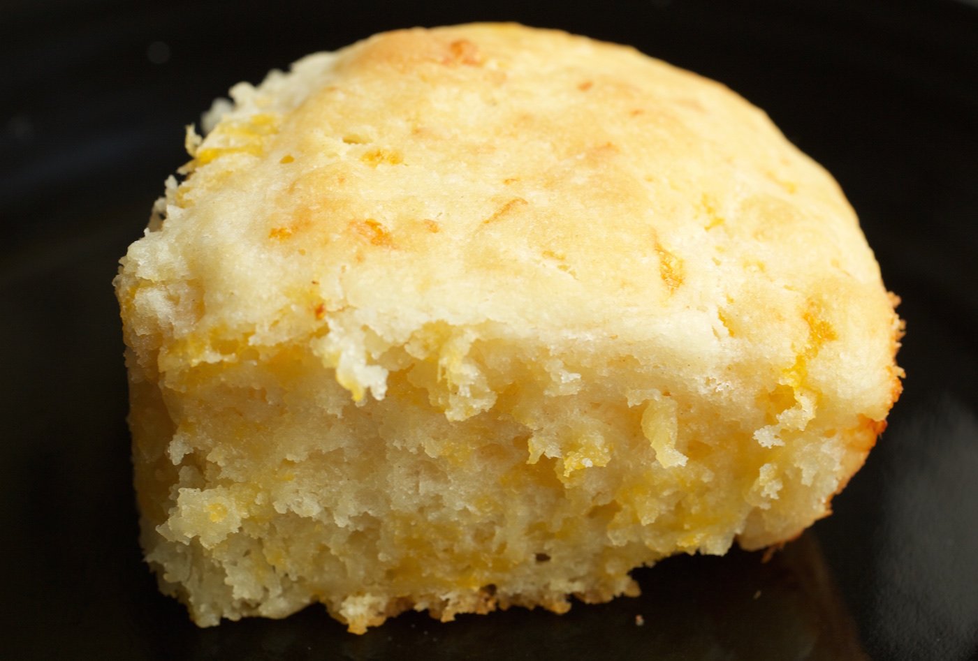 Close up of a cheddar buttermilk biscuit.