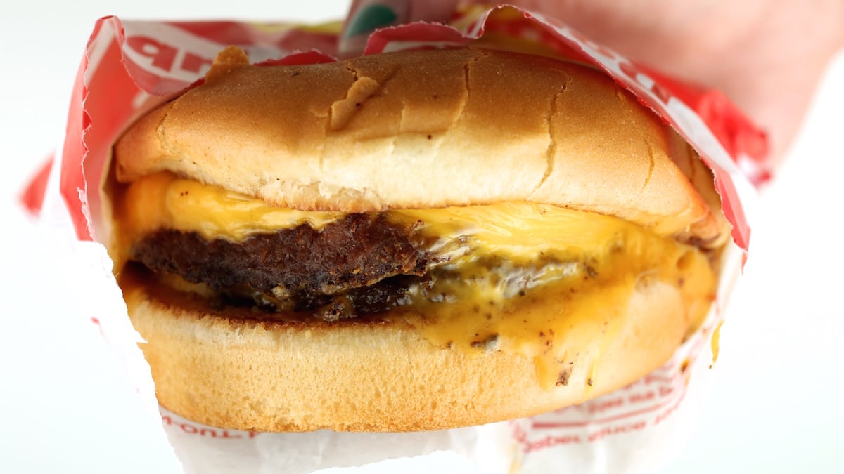 A double double burger from In-N-Out with no vegetables, just cheese.