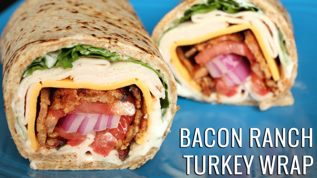 Bacon Ranch Turkey Wrap sliced to see the inside. 