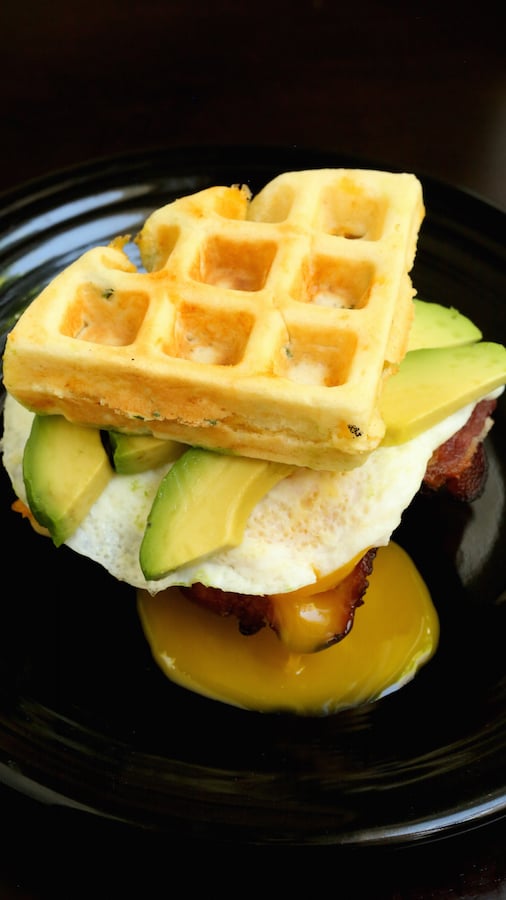 Cheddar Waffle BAE Breakfast Sandwich on a plate serving plate.