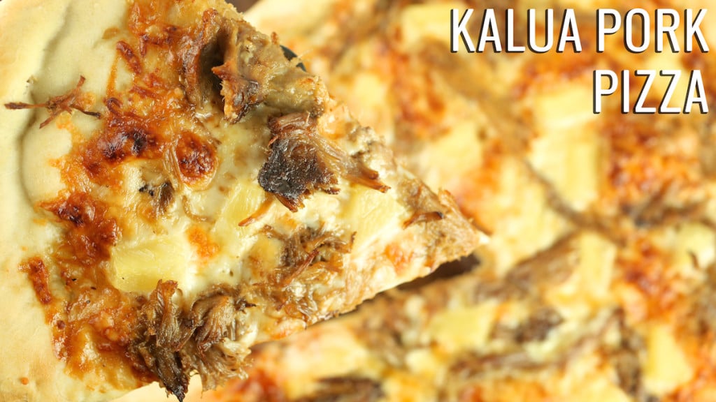 Close up of a piece of pork and pineapple pizza being held over the rest of the pizza. Text reads "Kalua Pork Pizza"