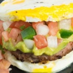 Slow Carb Breakfast Sandwich Recipe: A homemade pork sausage patty sandwiches between two eggs.