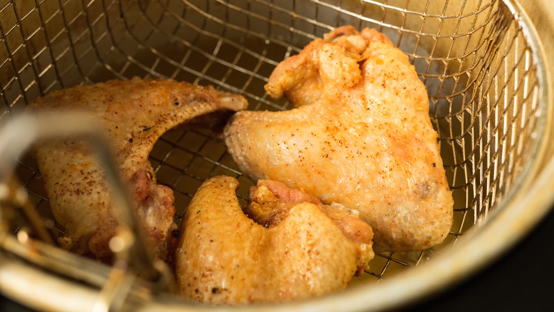 Wings just out of the deep fryer, about to get the honey sriracha lime glaze.