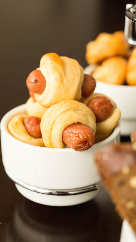 Mini pigs in a blanket ready to be dipped in the beer cheese fondue.