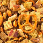 A classic snack with a modern, decadent twist. Duck Fat Chex Mix made in the crock pot.