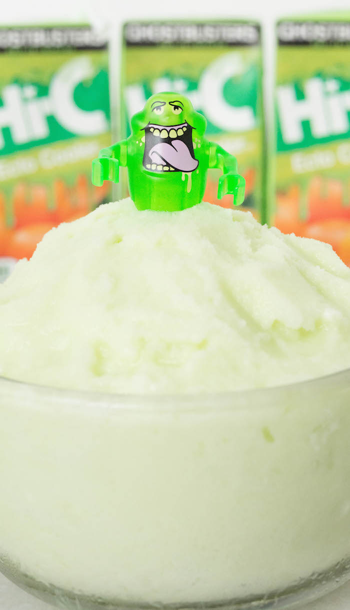 Close up of a bowl of light green Ecto Cooler sherbet ice cream.