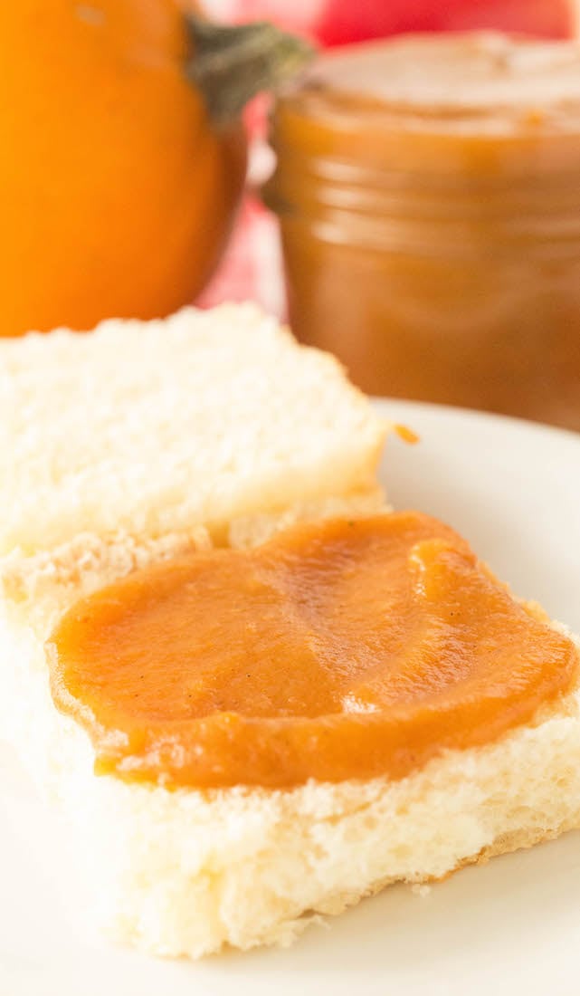 Vanilla Bean Pumpkin Apple Butter spread on top of a Hawaiian roll.