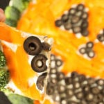 This Halloween Pumpkin Vegetable Pizza is a healthy, easy to make recipe.