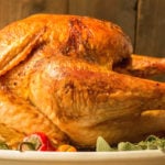 This flavorful Cajun Turkey recipe involves injecting Sriracha beer into the meat.