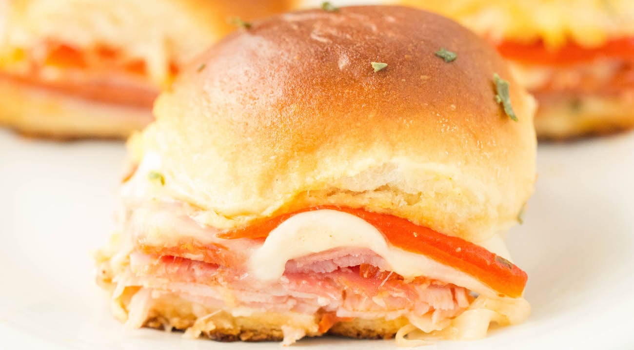 Close up of a Hawaiian Roll Italian Slider.