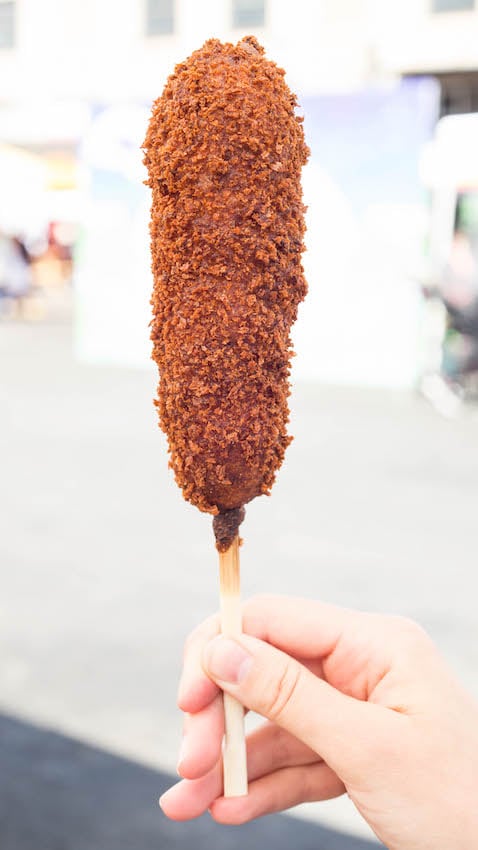 Katsu Corn Dog - Panko coated & fried corndog served with Katsu sauce.