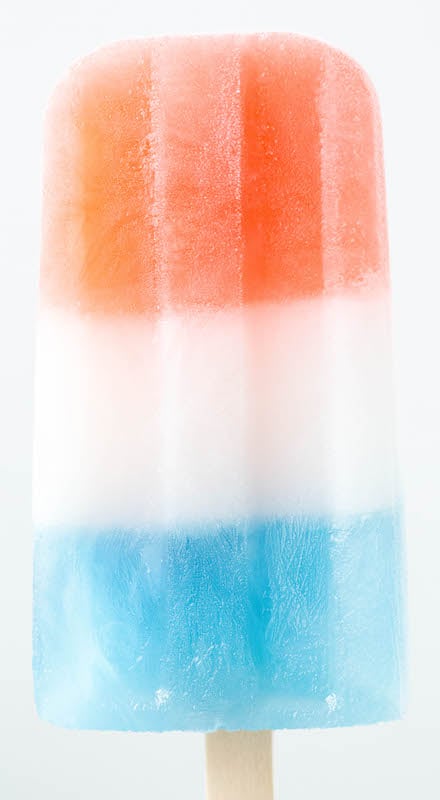 Close up of a homemade bomb pop with layers of red, white, and blue.