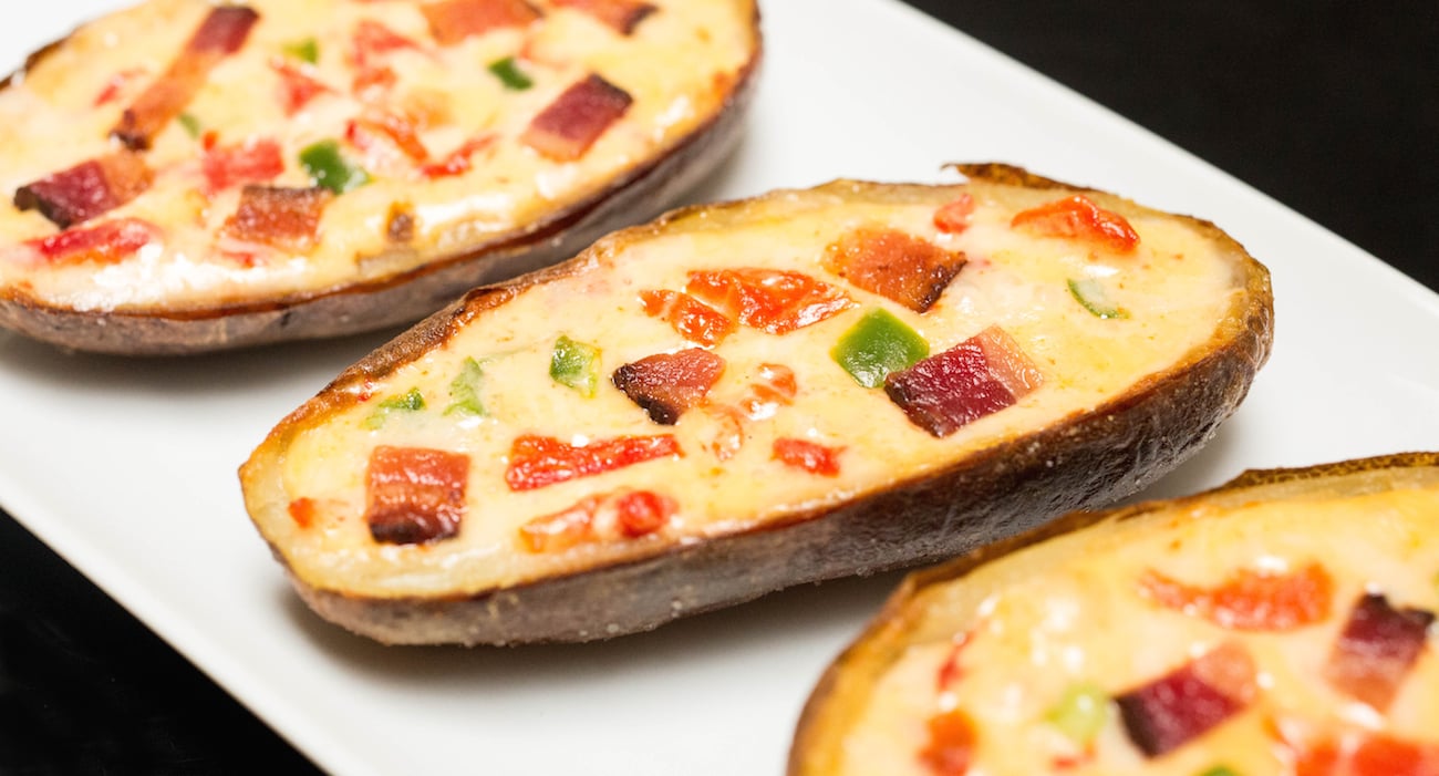 Three Pimento Cheese Potato Skins Recipe on a white plate.