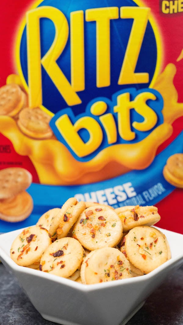 Ritz Bitz Cheese Fire Crackers in front of a box of Ritz bits cheese crackers.