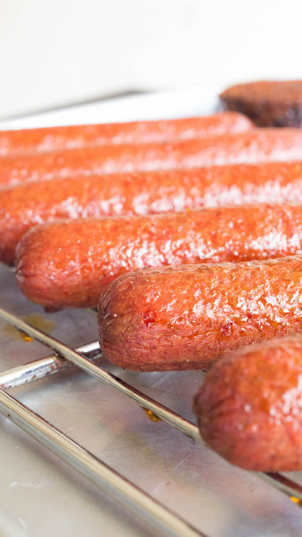 Smoked Hot Dogs on a baking rack.