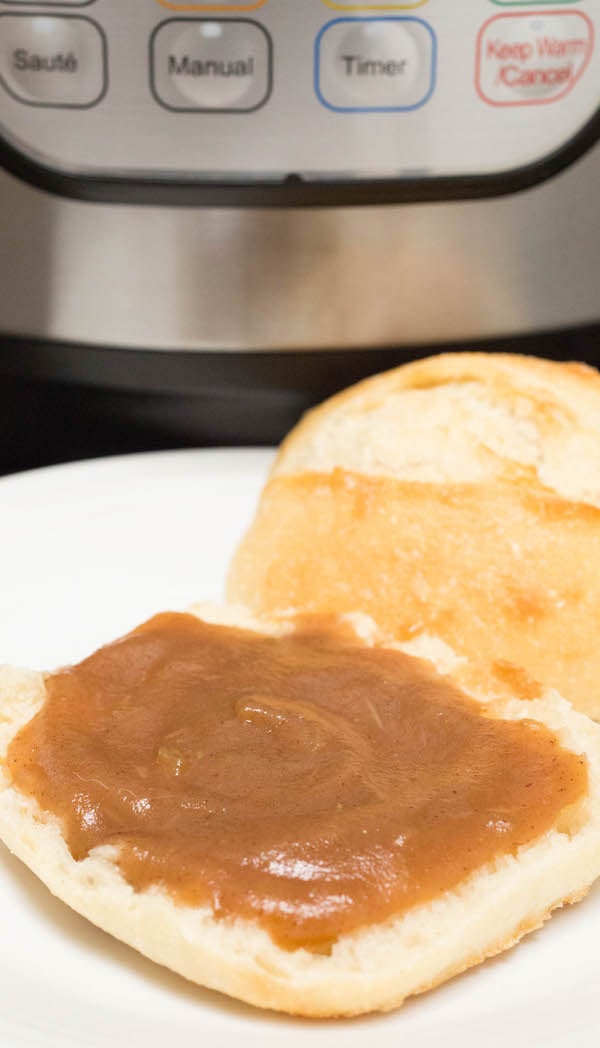 Close up of Instant Pot Apple Butter on a roll.