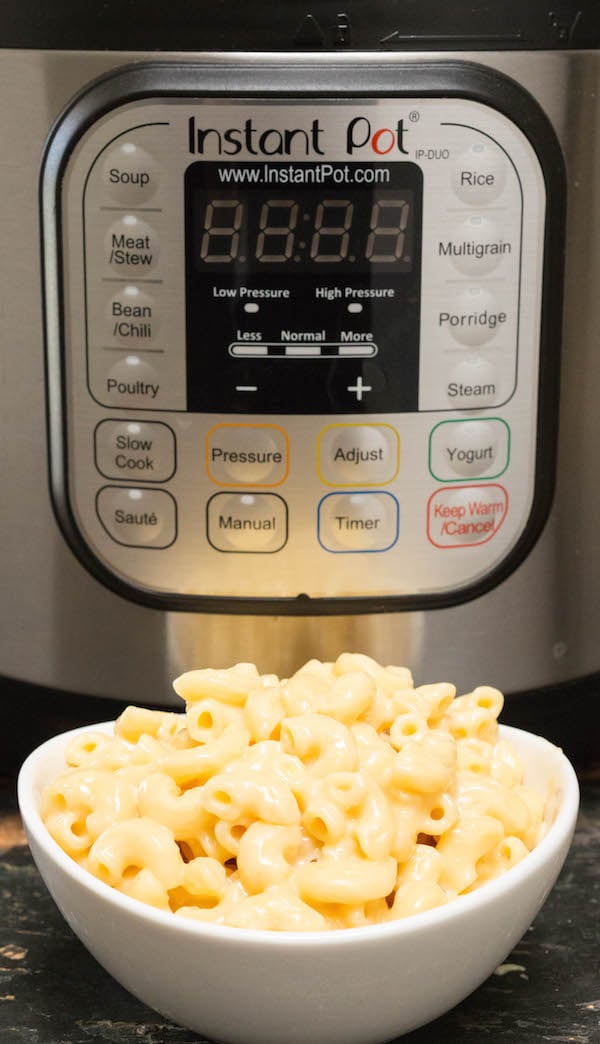 Instant Pot Mac & Cheese in front of the Instant Pot.