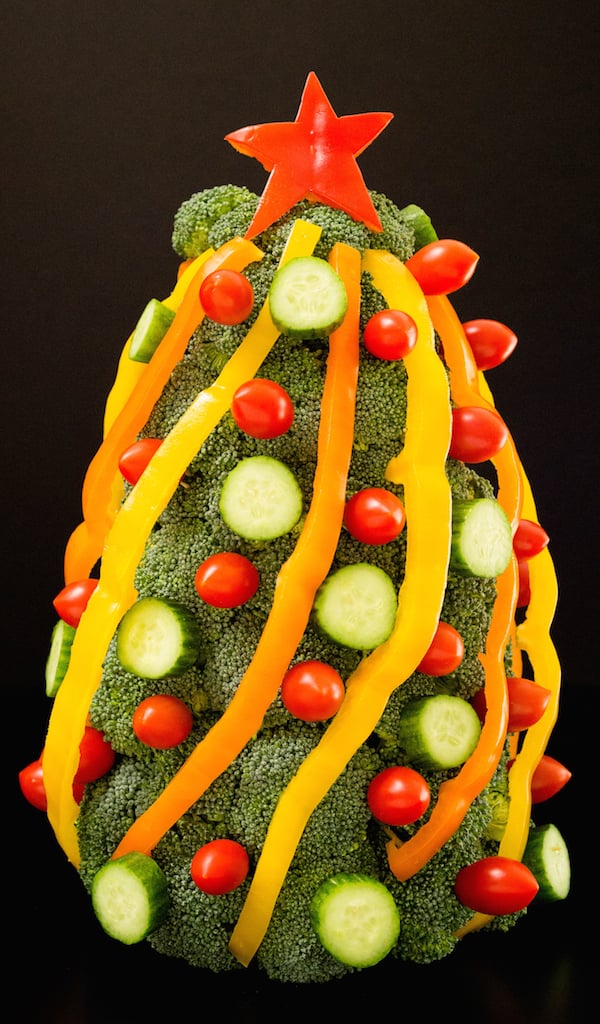 3-D Christmas Tree Shaped Veggie Tray on a black background.