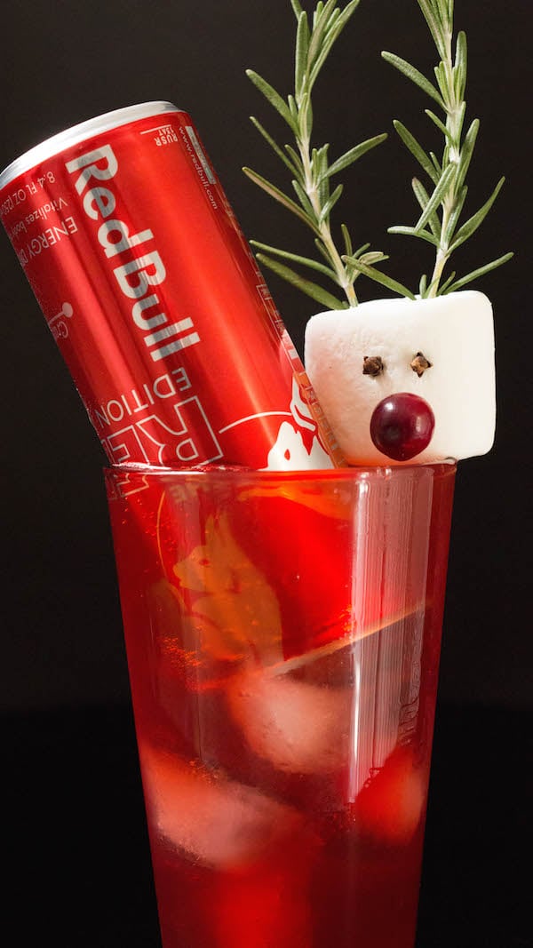 Rudolph the Red Bull Cocktail with a red Red Bull Can and marshmallow Rudolph garnishes. 