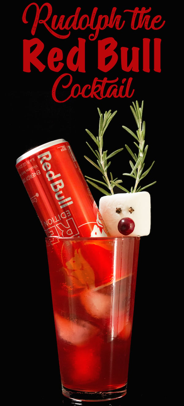 Rudolph the Red Bull Cocktail Christmas Drink in a pint glass on a black background.