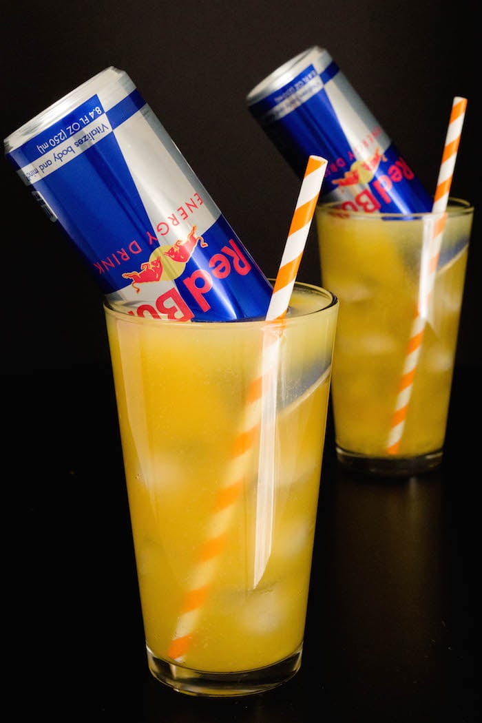 Two pint glasses filled with Red Bull Vitamin C cocktails.