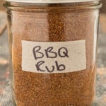 BBQ spice rib in a glass mason jar on a wood background