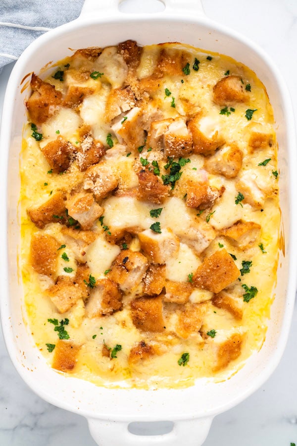 Overhead shot of a white 9x13 dish filled with baked Chicken Cordon Bleu Casserole.