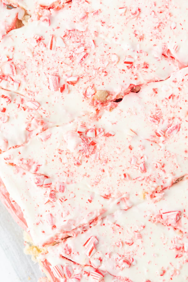 Overhead look at the frosted top of a candy cane cookie bar