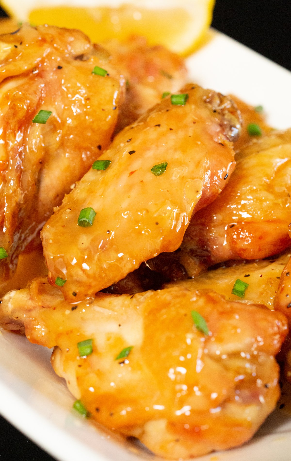 Close up of honey lemon pepper chicken wings.