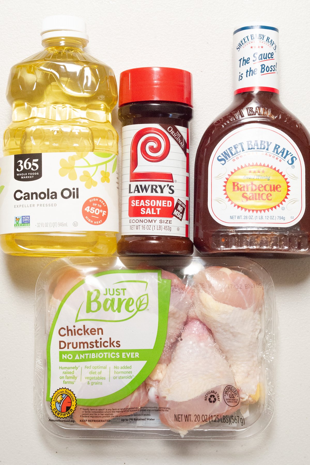 Air fryer bbq chicken ingredients arranged on a table.