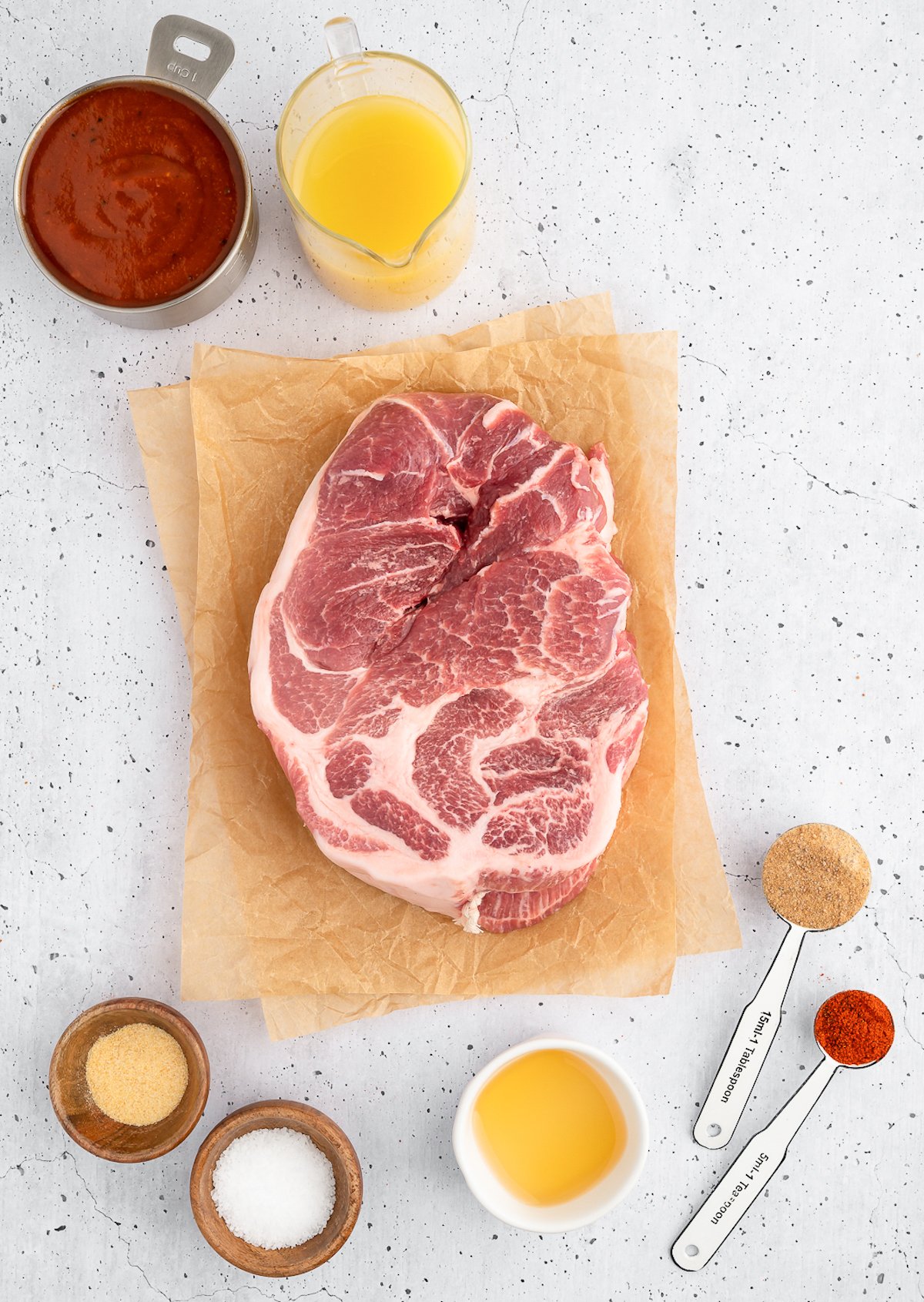 Overhead view of the raw ingredients needed to make Instant Pot pork butt.